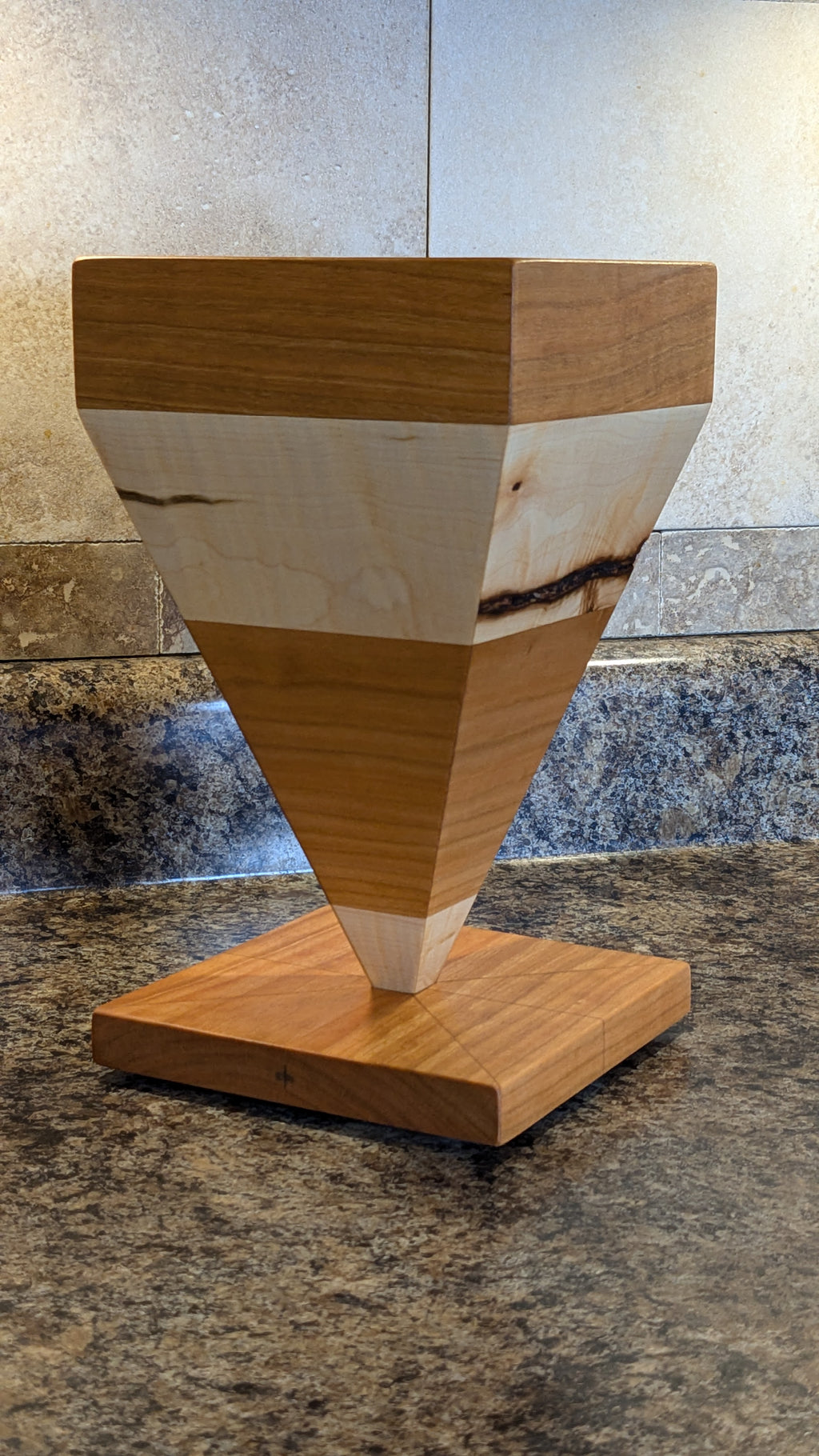 The first upside down pyramid knife holder