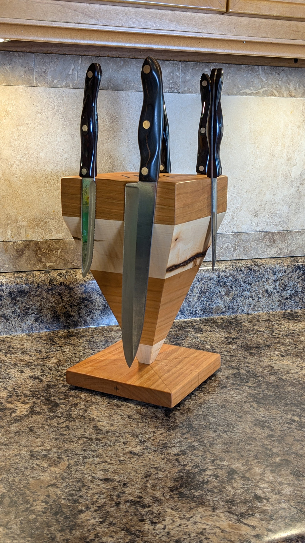 The first upside down pyramid knife holder